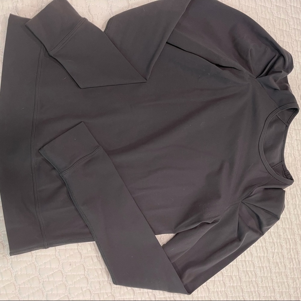 Charcoal colored Lululemon long sleeve in size 4. Excellent condition!